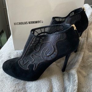 Beautiful black suede and sheer design detail bootie. Perfect for sexy nights!